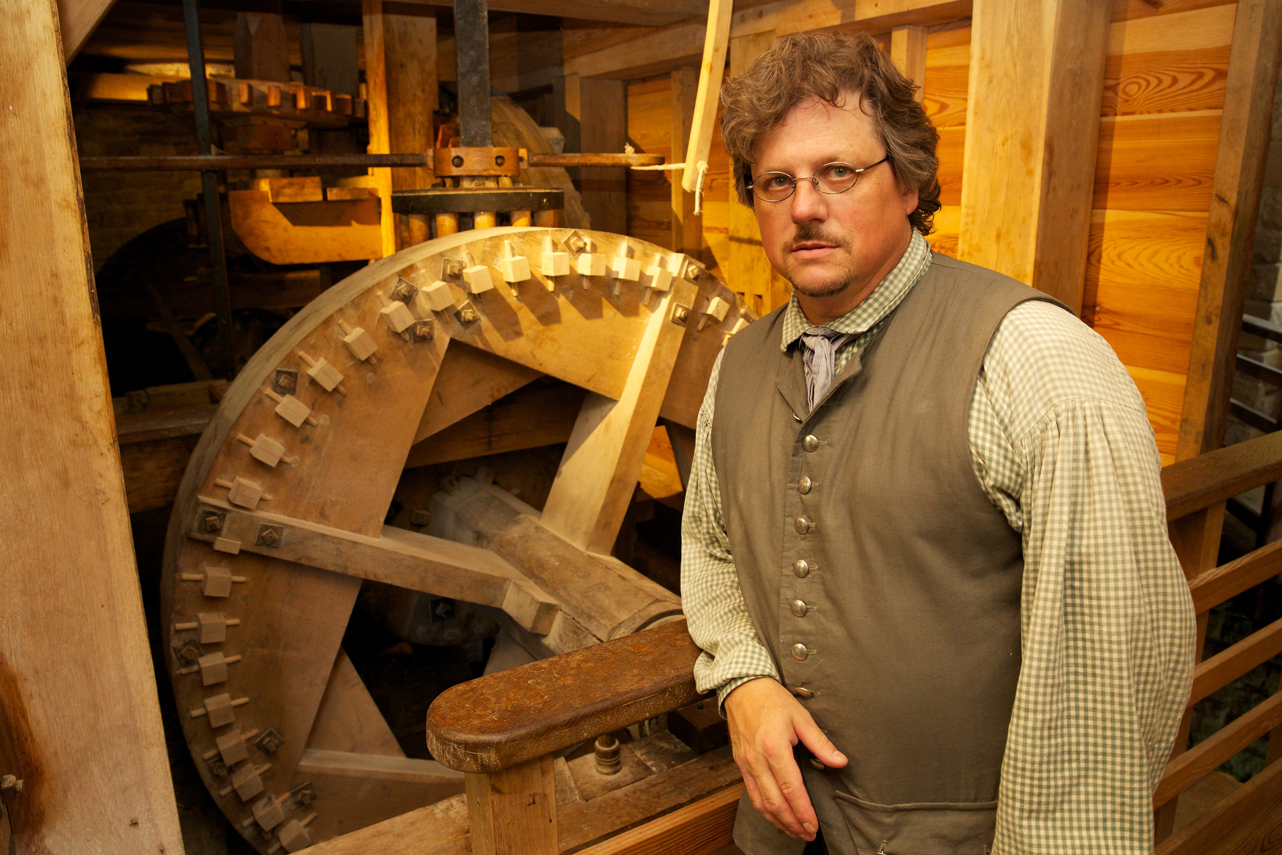 Steve Bashore inside George Washington's reconstructed gristmill.