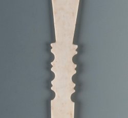 Bone fan blade; stick fragment.