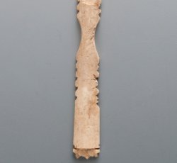 Bone fan blade; guard.