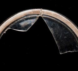Conical, folded wine glass foot.